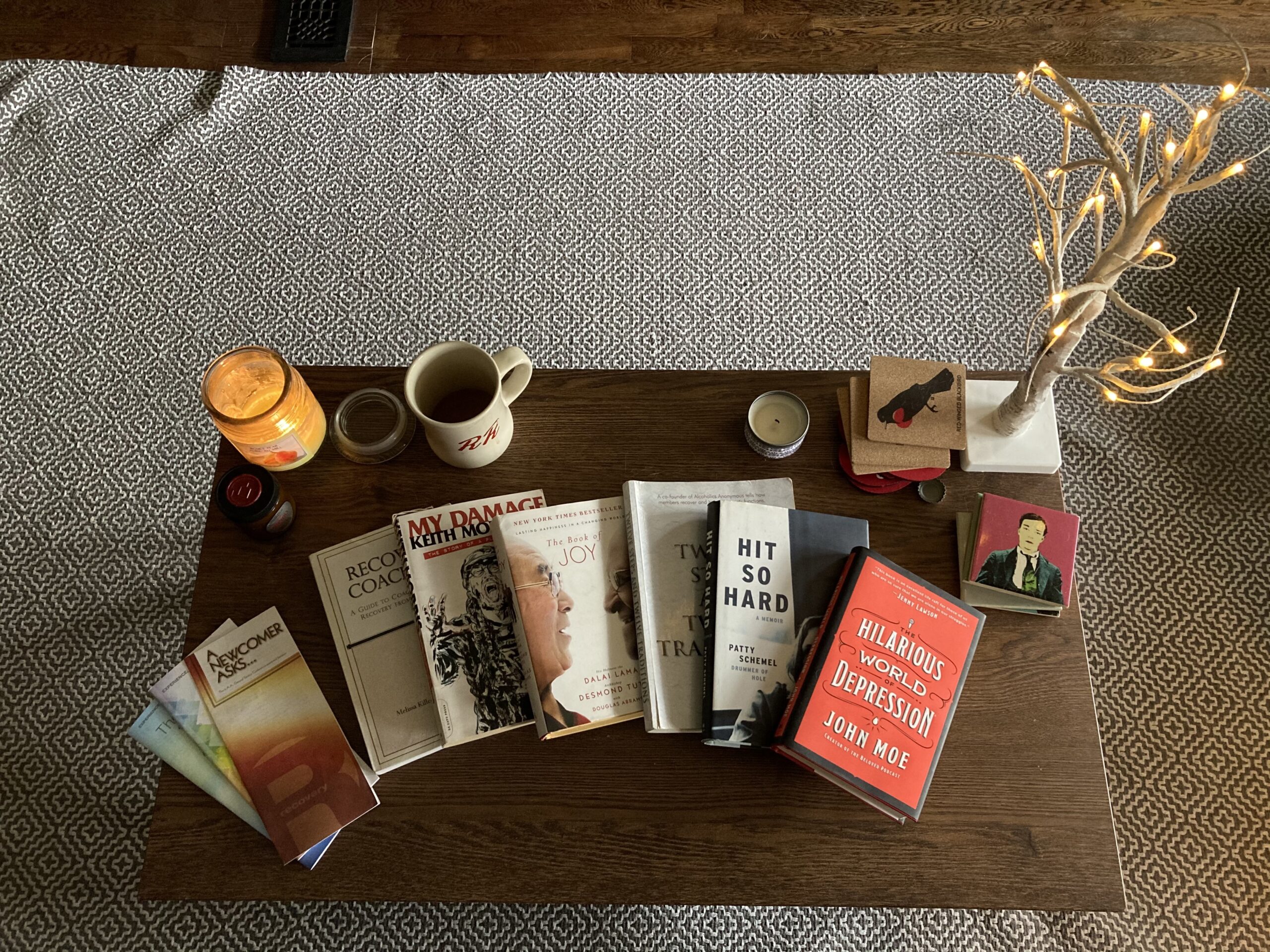 A table of books at a Passenger Recovery meeting